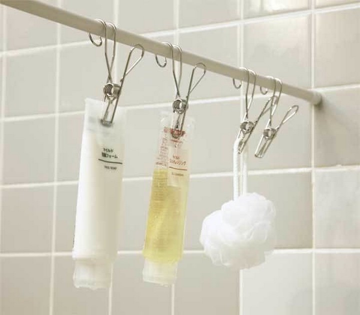46 Useful Storage Ideas - Hang bath products on your shower bar for easy access.