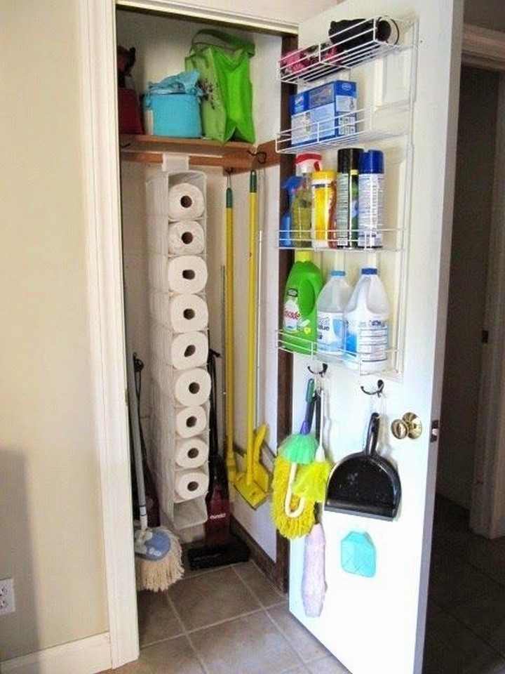 46 Useful Storage Ideas - Hang an old shoe organizer in the closet to store paper rolls or other cleaning supplies.