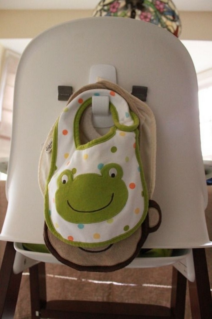 46 Useful Storage Ideas - Install an adhesive hook behind your baby's high chair to hang baby bibs or other baby supplies.