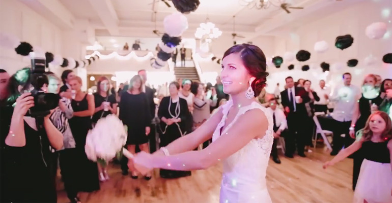 Bride and groom help their friends get engaged at their wedding with a surprise wedding reception proposal.
