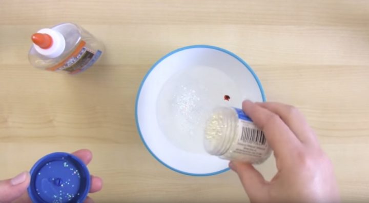 How to make glitter slime - Step 3: Add 1 tablespoon of glitter (add more or less depending on your preference) and stir until blended. Tip: use the tip of the empty glue bottle as a stir stick!