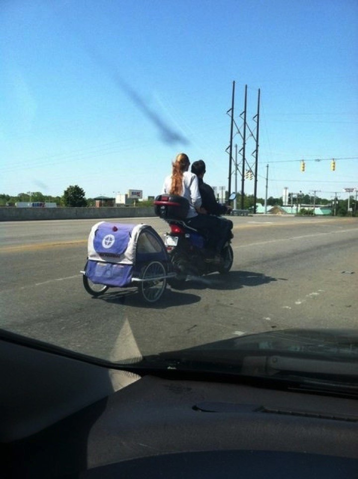 34 Parenting Fails - I think baby bicycle strollers were designed for sidewalks, not highways!!