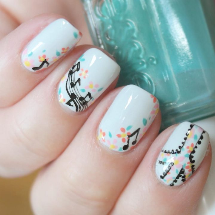 18 Music Nails - Give peace a chance with these musical psychedelic nails.