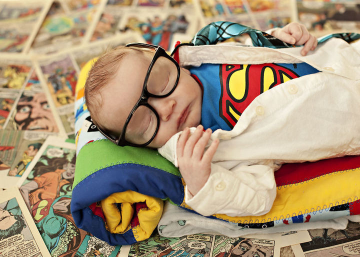 37 Newborns Wearing Geek Baby Clothes - Baby Clark Kent.