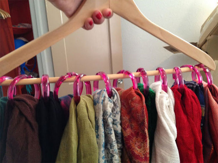 47 Amazing Life Hacks - Curtain Rings - Use old shower curtain rings and a clothes hanger to create a handy scarf holder.