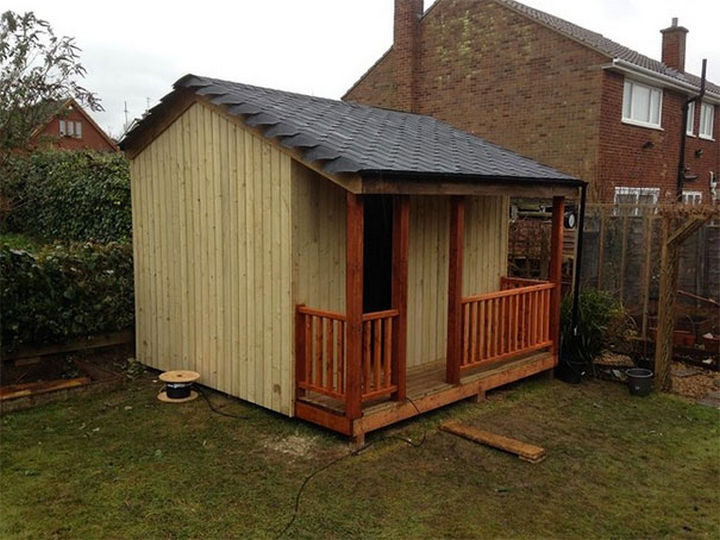 Next up is the shingles and even a cute porch was added.