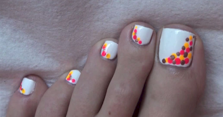 13 Pedicure Designs - Express yourself with colorful polka dots.