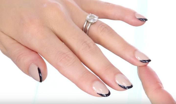 18 Gorgeous French Manicures With a Twist - Go curvy instead of straight across like a traditional French manicure.