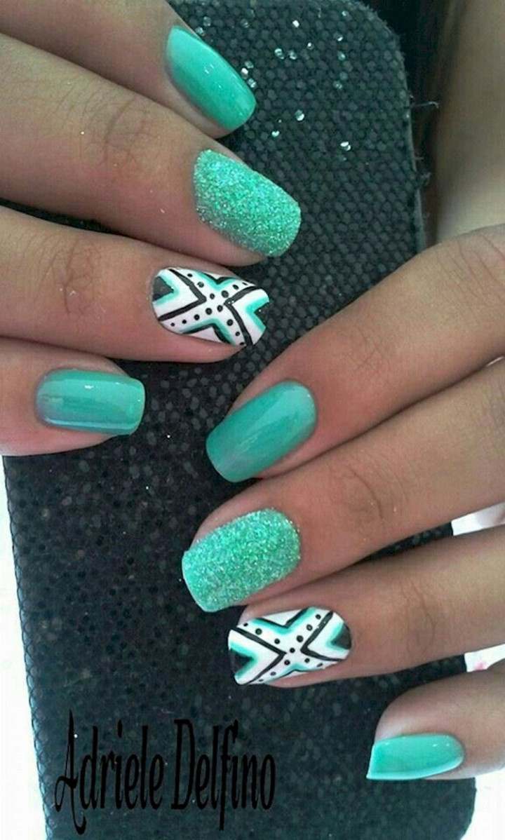 18 Green Manicures - Striking green patterns with accent nails.