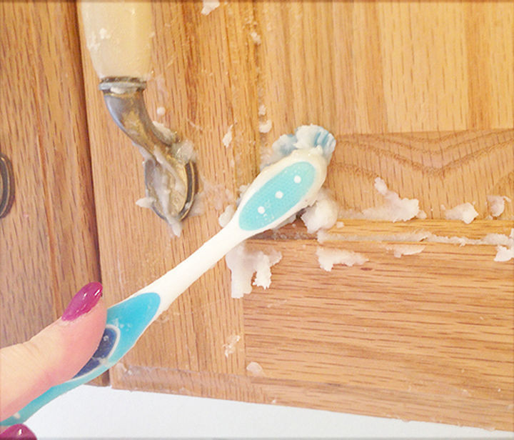 35 House Cleaning Tips - Remove gunk from your kitchen cabinets.