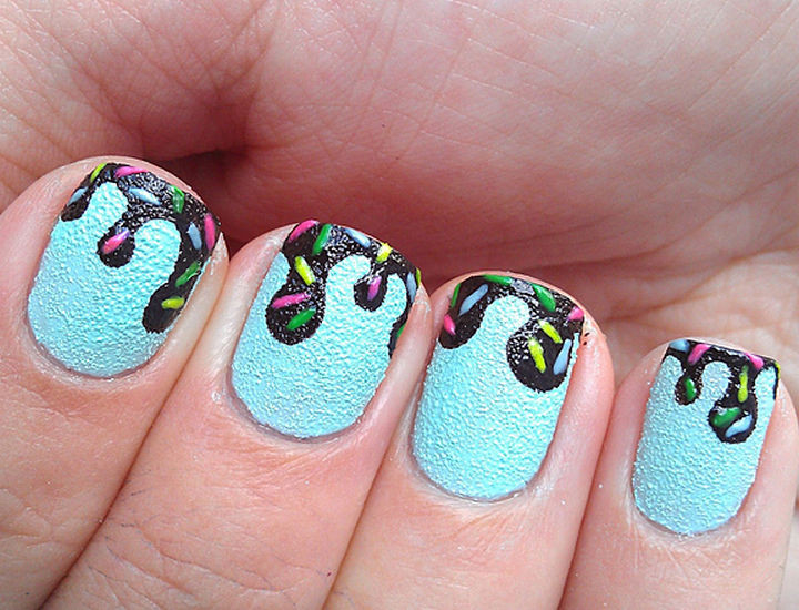 11 Dessert-Inspired Nail Art Designs - Dripping chocolate ice cream nails with sprinkles.