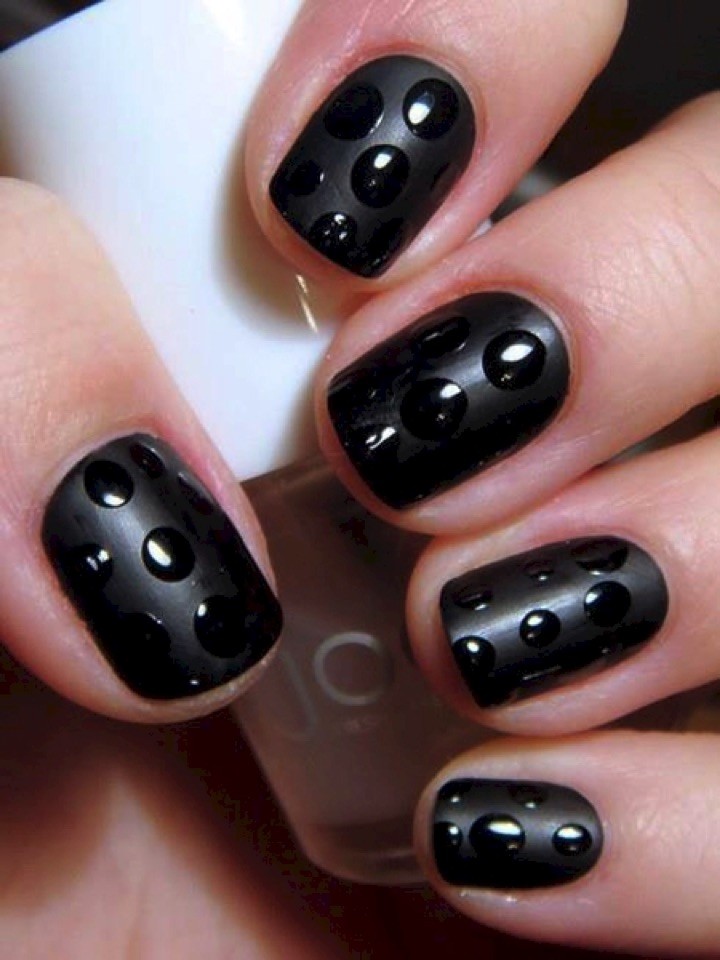 13 Easy Nail Designs - Create a cool 'water droplets' effect.