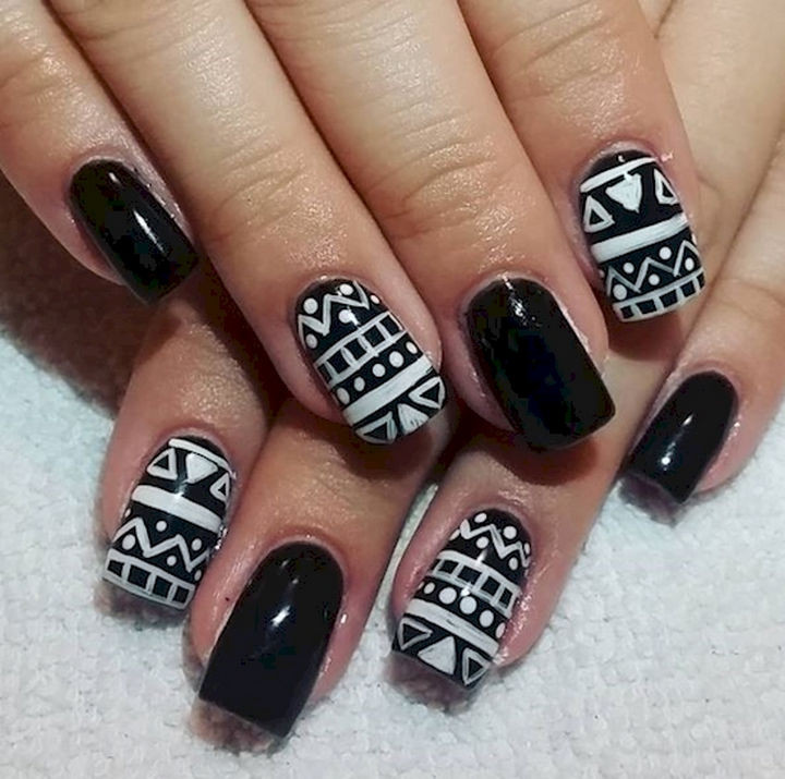22 Black Nails That Look Edgy and Chic - White on black nail art designs.