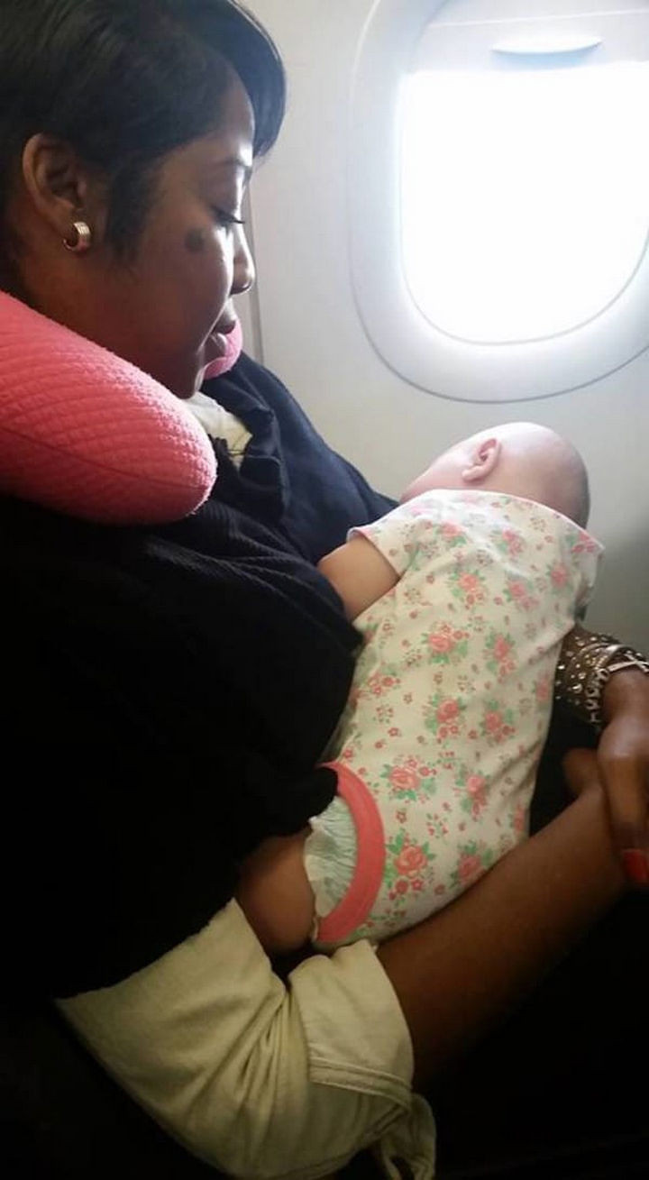 Nyfesha cared for the baby for the rest of flight and Rylee slept quietly the rest of the way. When they got off the plane, Nyfesha continued holding the baby while Rebekka put the stroller and car seat together.