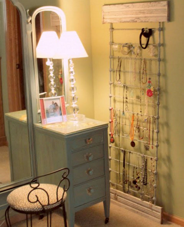 19 Ways to Repurpose Baby Cribs - Build a jewelry display rack.