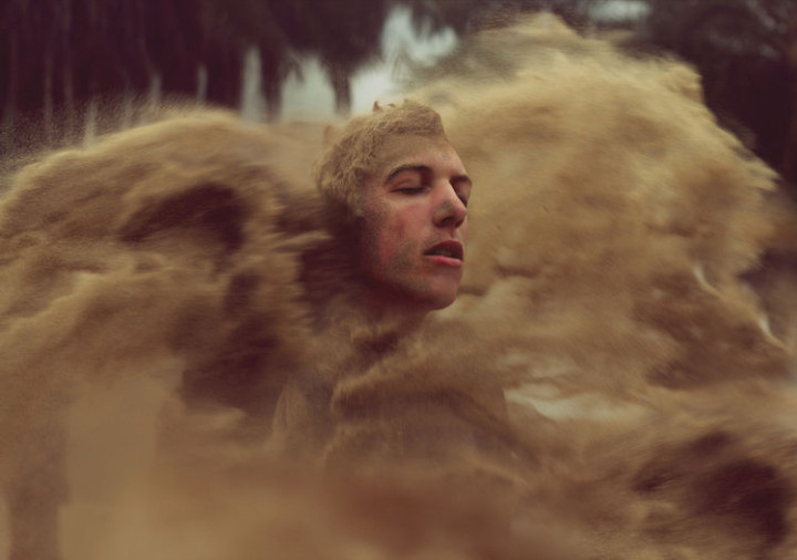 Here, he uses sand and flour for an interesting effect.