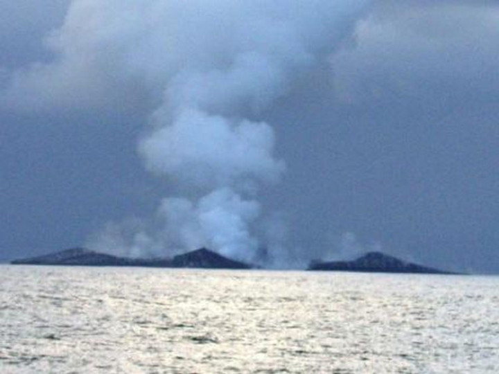 The volcano was forming an island right before their eyes.