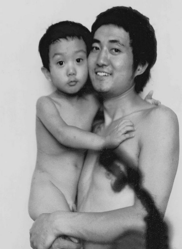 Father takes photo with his son every year. This one was taken in 1988