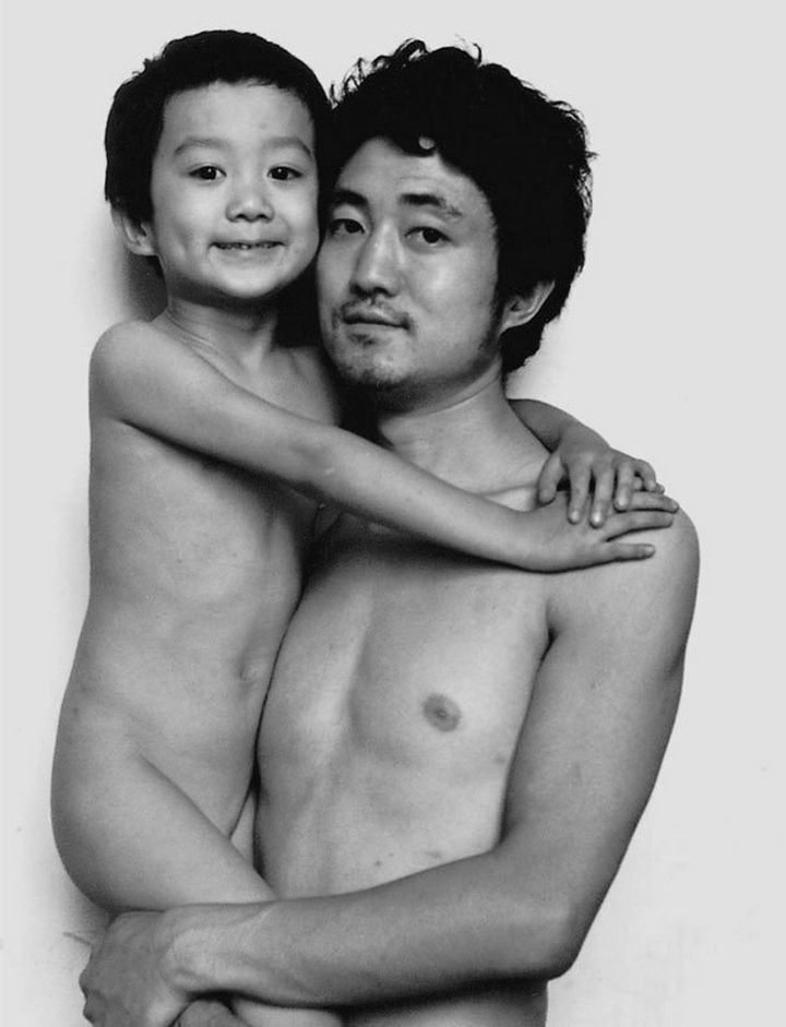 Father takes photo with his son every year. This one was taken in 1991