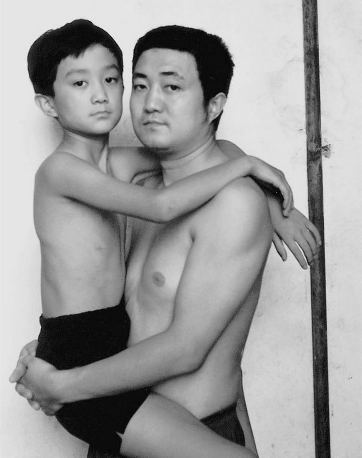 Father takes photo with his son every year. This one was taken in 1997