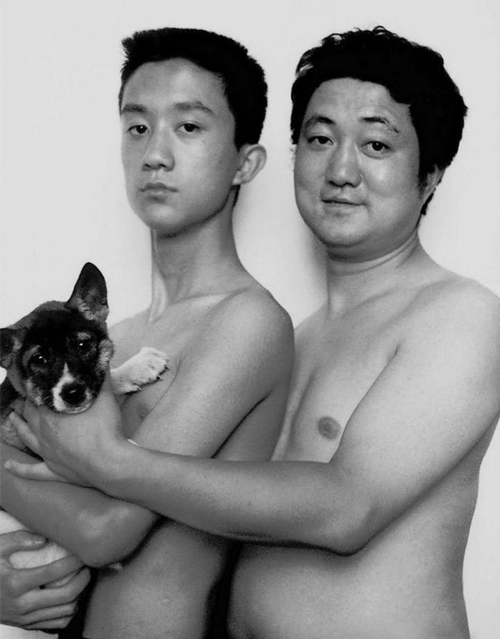 Father takes photo with his son every year. This one was taken in 2000