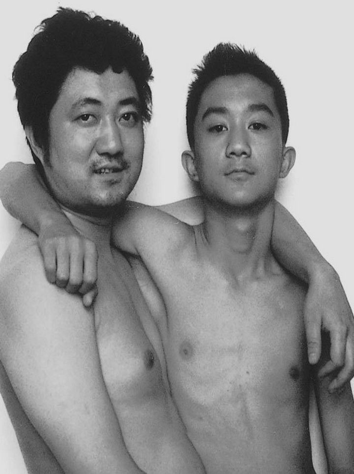 Father takes photo with his son every year. This one was taken in 2001.
