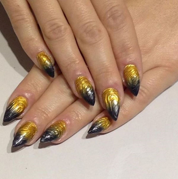 18 3D Nails - Stylish swirling black and gold nails.