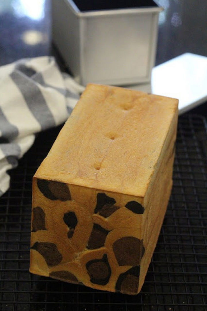 As the bread rises and bakes, it creates a unique loaf of bread with leopard prints.