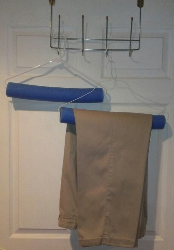 12+ Pool Noodle Hacks - Prevent creases when hanging your clothes.