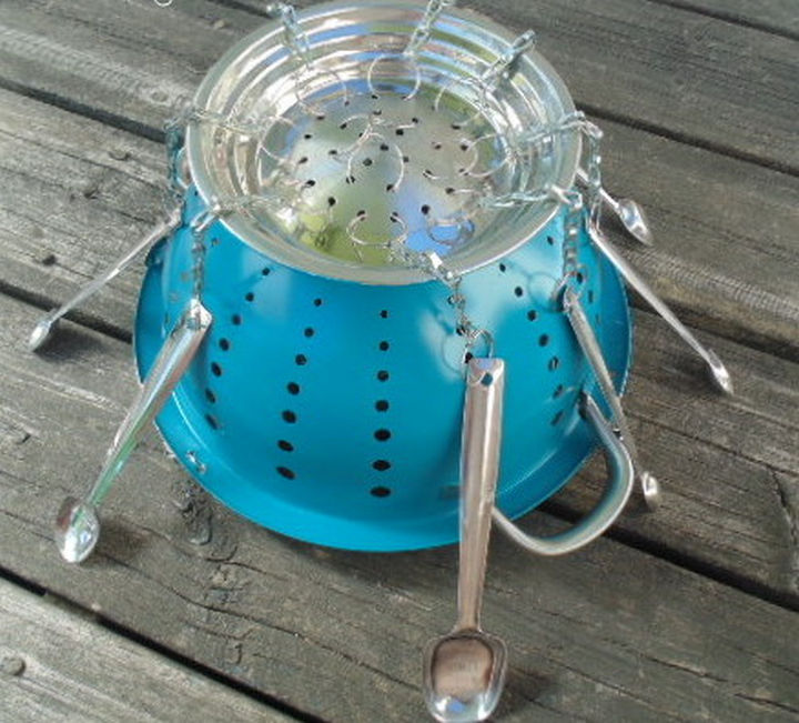 14 DIY Gardening Tips & Projects - Create a colander planter wind chime.