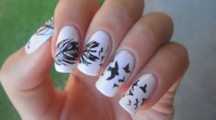 18 Feather Nail Art Designs - Birds flying out of a feather.