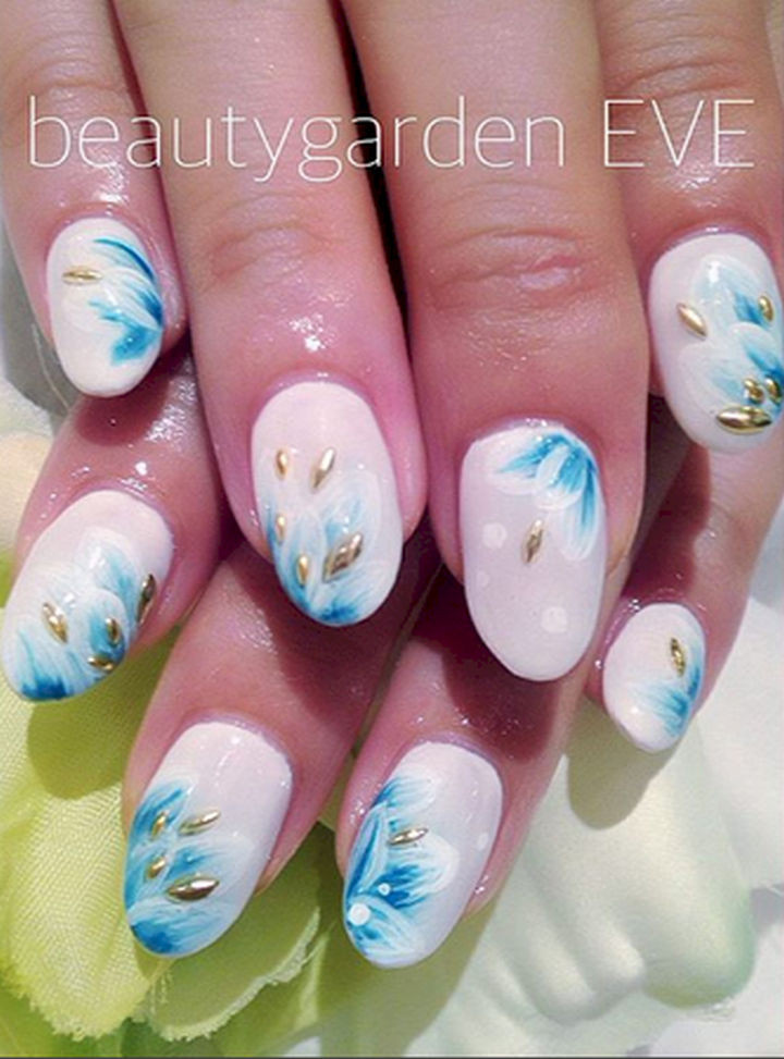 18 Feather Nail Art Designs - 3D textured feather nails.