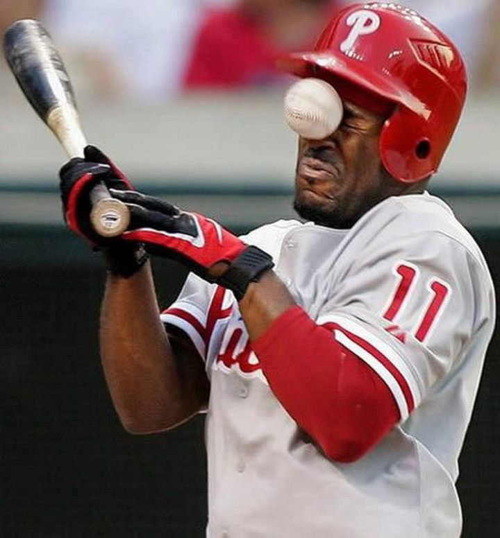 19 People Having a Bad Day - I bet he wishes baseball helmets came with face guards.