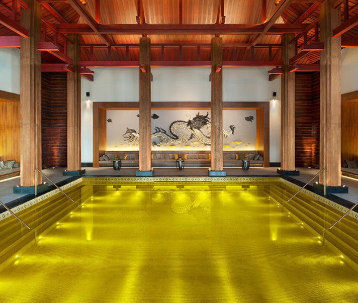 35 Epic Swimming Pools From Around the World - Gold energy pool at St. Regis in Lhasa, Tibet.