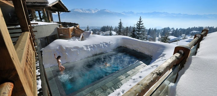 35 Epic Swimming Pools From Around the World - LeCrans Hotel and Spa in Crans Montana, Switzerland.