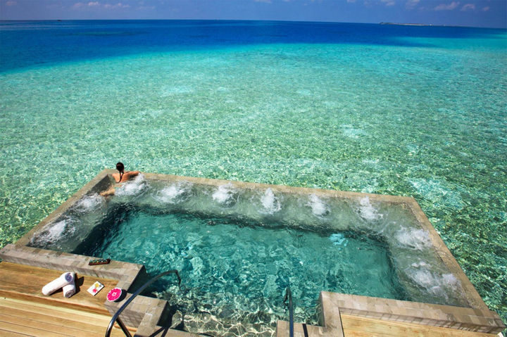 35 Epic Swimming Pools From Around the World - Velassaru Resort in the Maldives.
