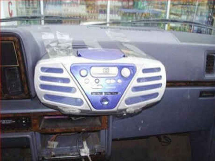 18 Funny Life Hacks - Add a new in-dash CD player.