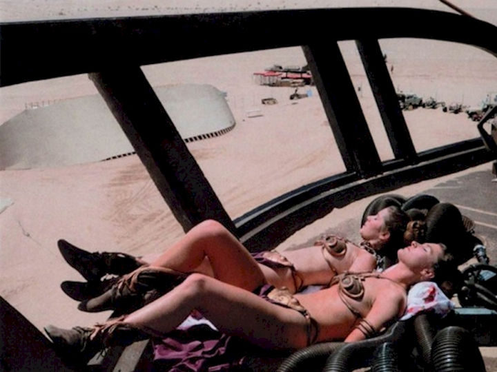 Carrie Fisher taking a break with a her stunt double on the set of "Star Wars: Episode VI - Return of the Jedi."