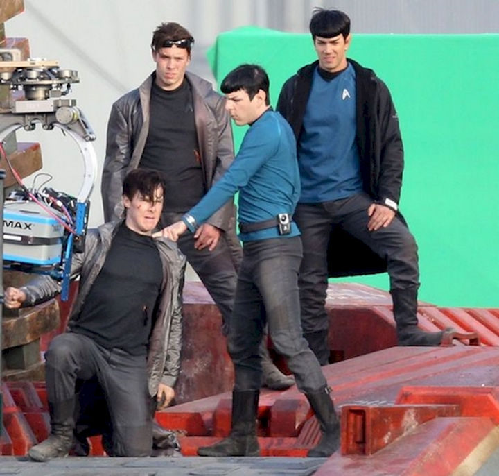 23 Celebrities Hanging Out With Their Stunt Doubles - Benedict Cumberbatch and Zachary Quinto rehearse a fight scene with their respective stunt doubles on the set of "Star Trek Into Darkness."
