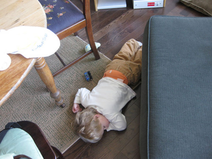 25 Kids Sleeping in the Strangest Places - Crashing on the floor.