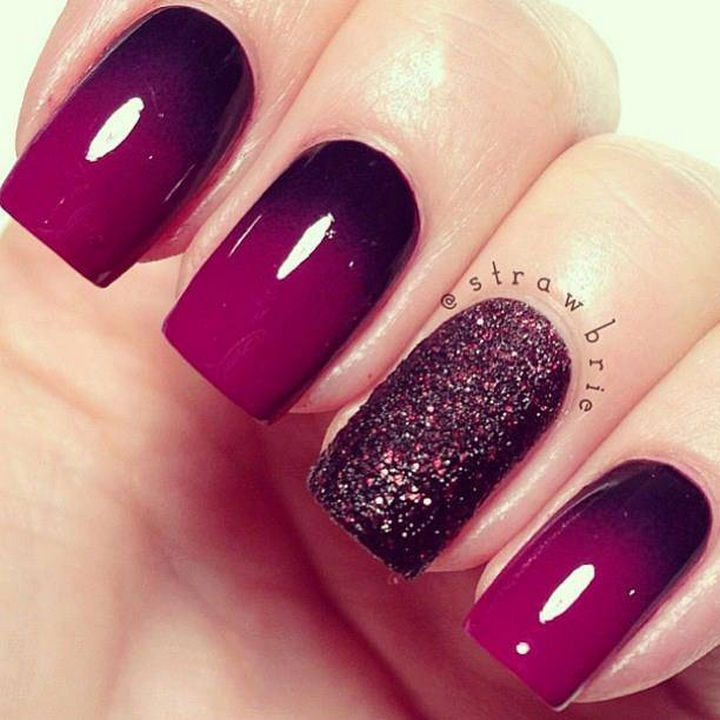 Dark purple ombré nails with a gorgeous glittering accent nail.