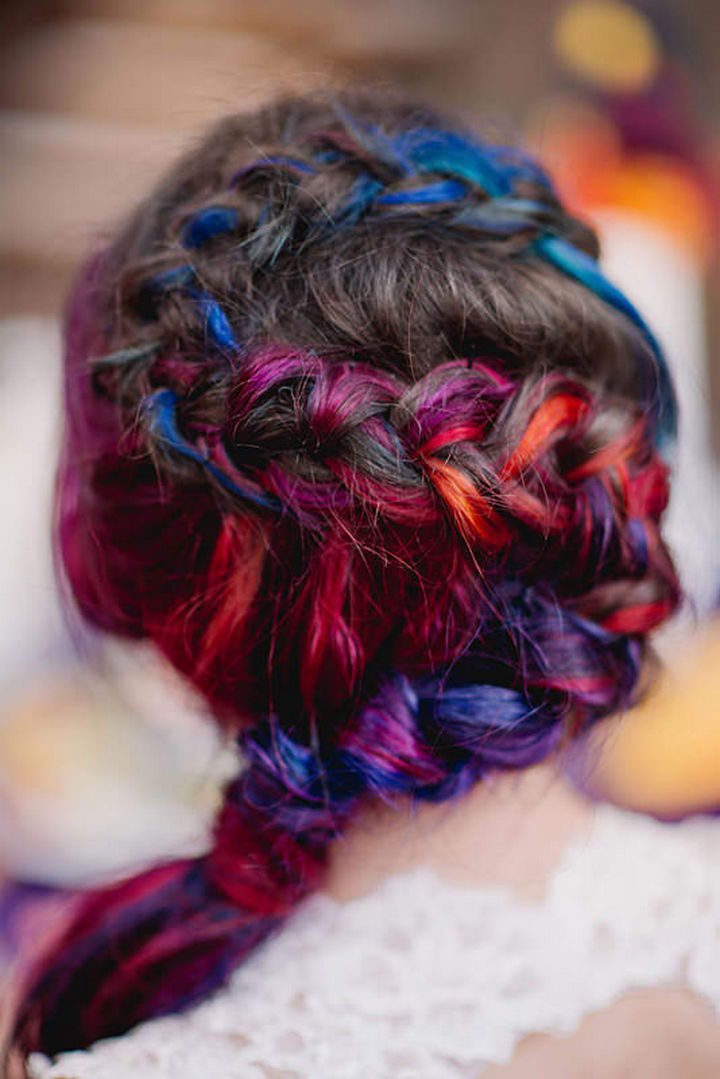 She settled on a "sunset" color theme and proceeded to dye her hair using the same colors as her ombre wedding dress.