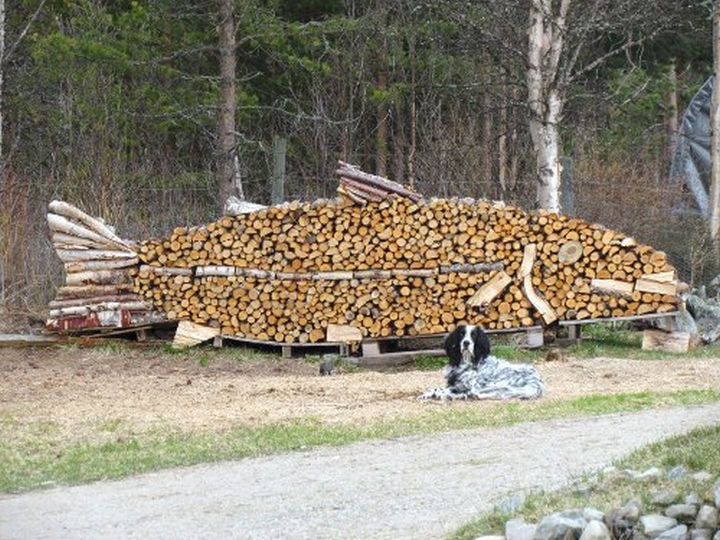13 Displays of Stacked Wood Art - Catching a fish this big would be an angler's dream.