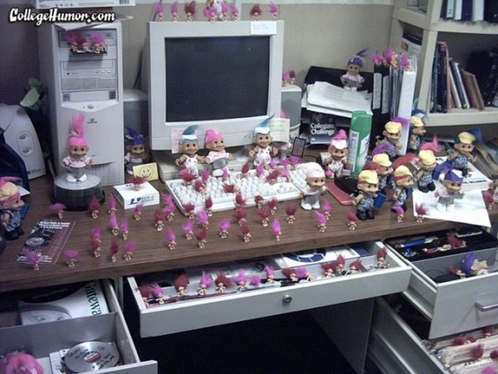 26 Funny Office Pranks - Who wouldn't like a desk full of Trolls.