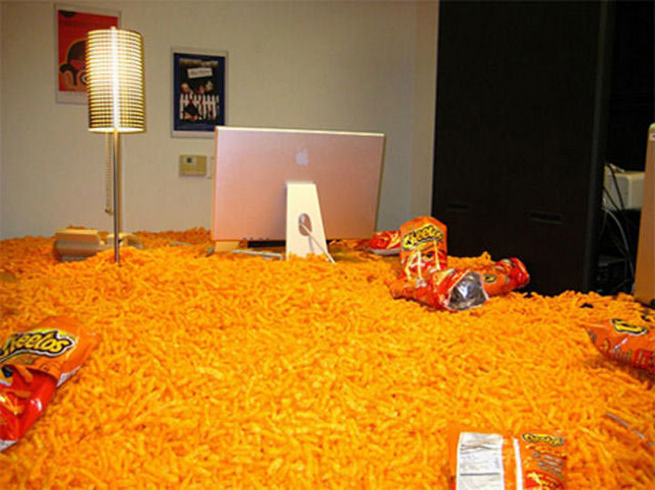 26 Funny Office Pranks - Who's in the mood for Cheetos?
