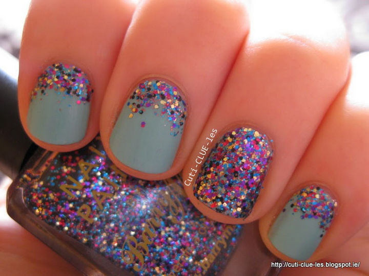 Super cute and fun glitter reverse gradient nails with full glitter accent nail.