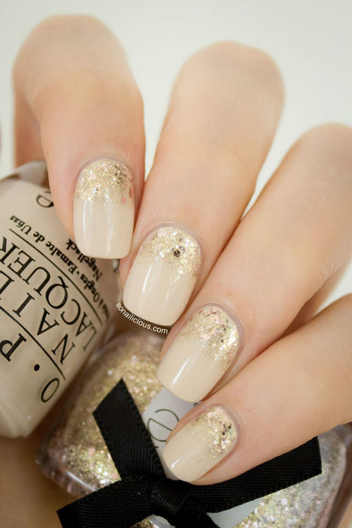 Golden Hour reverse glitter gradient nails inspired by the opulence of Abu Dhabi and Dubai.