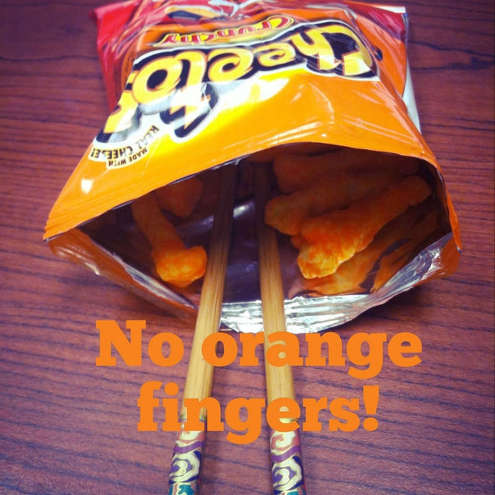26 Simple Life Hacks - A great way to avoid Cheetos fingers. Practice your chopstick skills at the same time!
