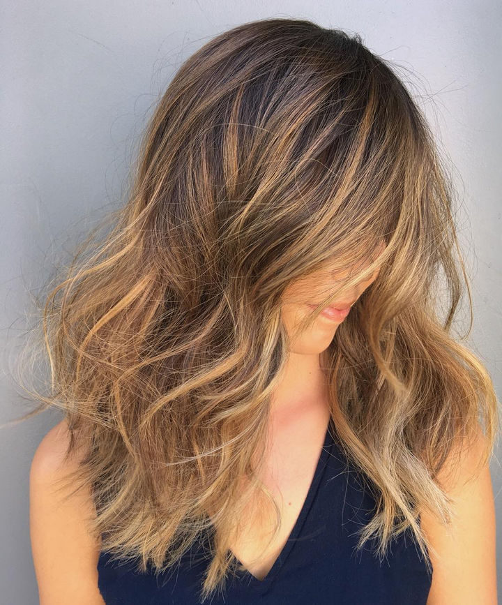 14 Lazy Girl Hair Hacks - Use dry shampoo at bedtime to wake up to super voluminous hair in the morning.