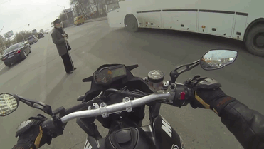 10 Random Acts of Kindness - A motorcyclist protecting an elderly man while he crosses the road.